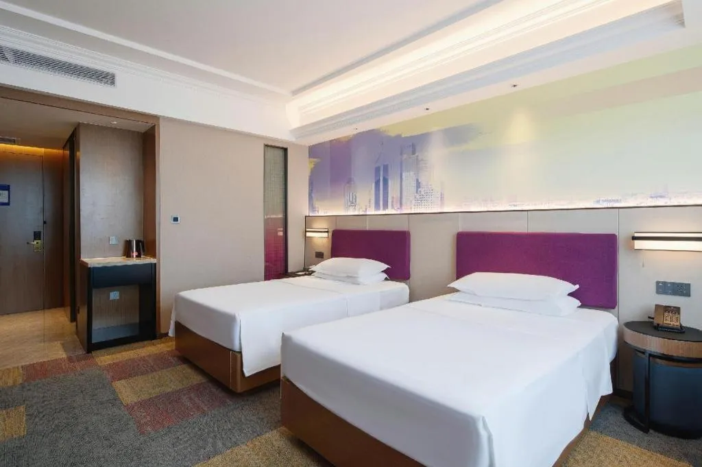 Bed in Vienna Hotel Qingdao Jiaozhou Branch