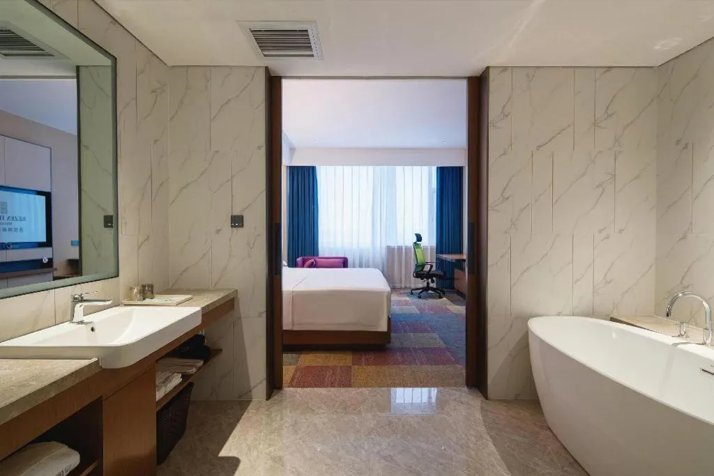 Bed in Vienna Hotel Qingdao Jiaozhou Branch