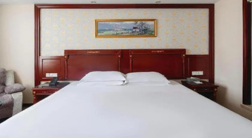 Bed in Vienna Hotel Qingdao Jiaozhou Branch