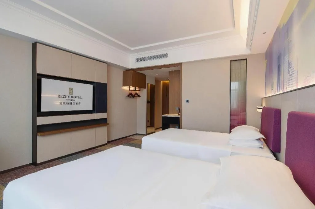 Bed in Vienna Hotel Qingdao Jiaozhou Branch
