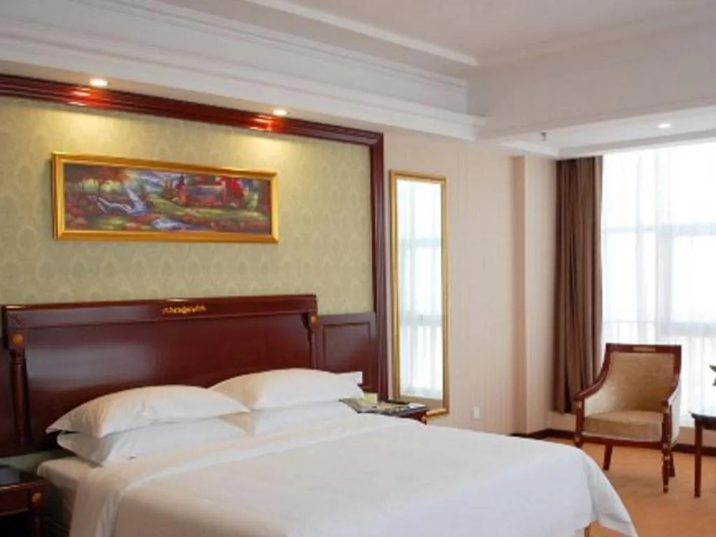 Bed in Vienna Hotel Qingdao Jiaozhou Branch