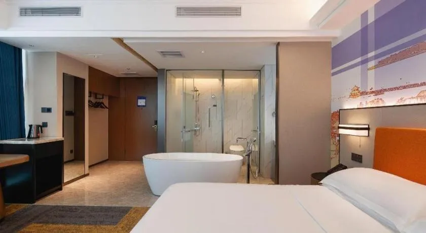 Bed in Vienna Hotel Qingdao Jiaozhou Branch