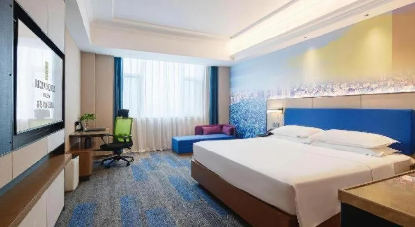 Bed in Vienna Hotel Qingdao Jiaozhou Branch