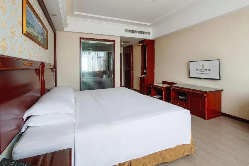 Bed in Vienna Hotel Qingdao Jiaozhou Branch