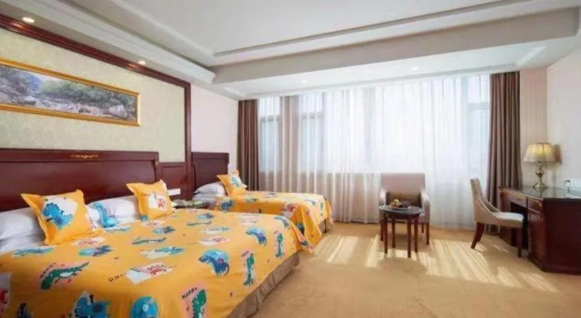 Bed in Vienna Hotel Qingdao Jiaozhou Branch