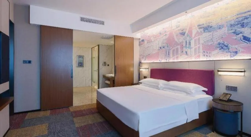 Bed in Vienna Hotel Qingdao Jiaozhou Branch