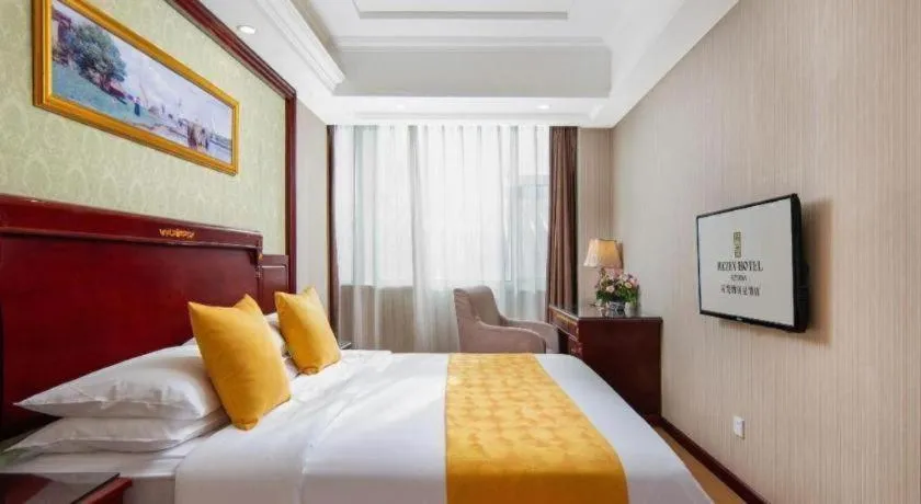 Bed in Vienna Hotel Qingdao Jiaozhou Branch