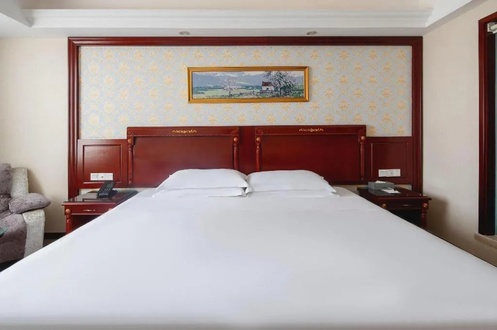 Bed in Vienna Hotel Qingdao Jiaozhou Branch