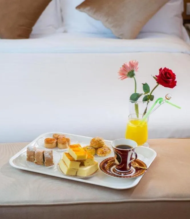 Bed in Vienna International Hotel Guangzhou Baiyun Dayuanli Plaza