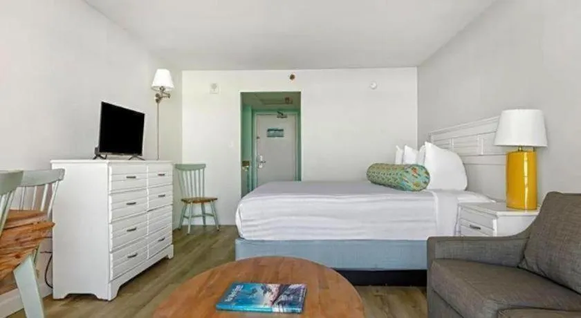 Bed in Sand Castle Resort by Patton Hospitality