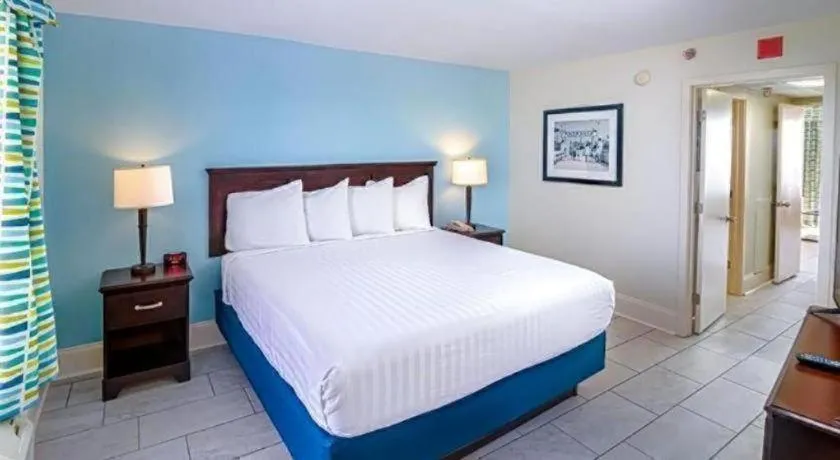 Bed in Sand Castle Resort by Patton Hospitality