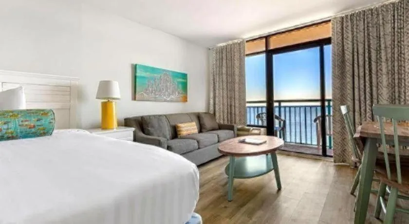 Bed in Sand Castle Resort by Patton Hospitality