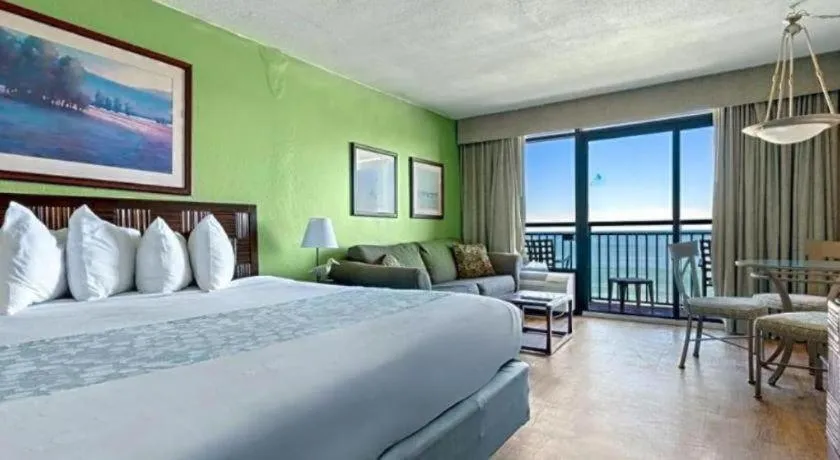 Bed in Sand Castle Resort by Patton Hospitality