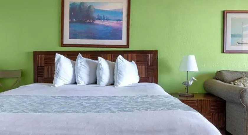 Bed in Sand Castle Resort by Patton Hospitality