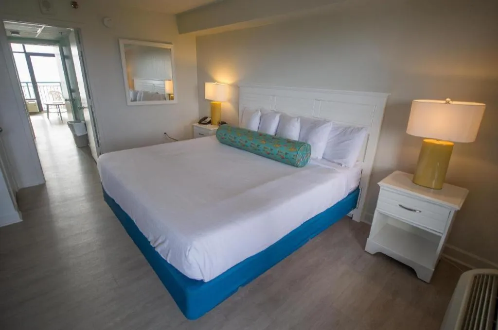 Bed in Sand Castle Resort by Patton Hospitality