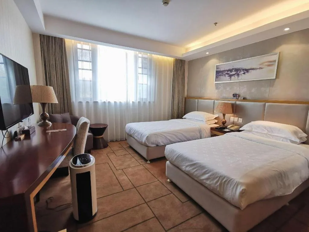 Bed in Jinjiang Metropolo Shanghai Minhang