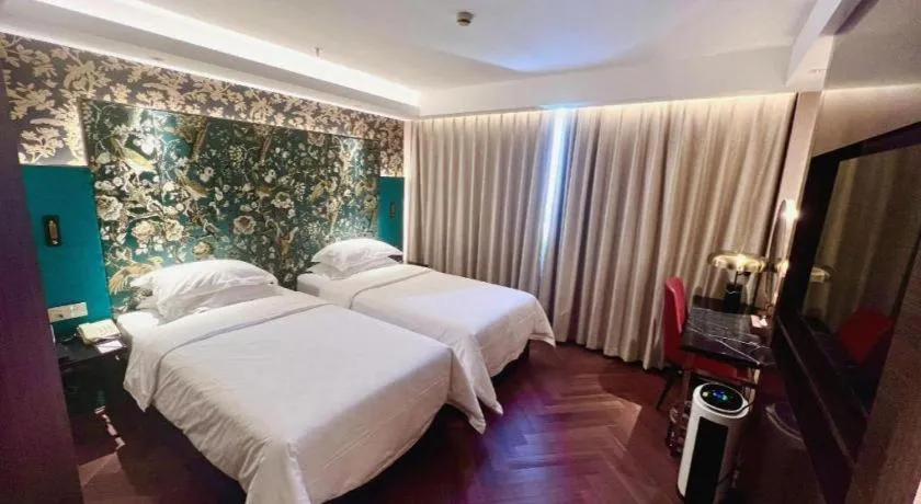 Bed in Jinjiang Metropolo Shanghai Minhang