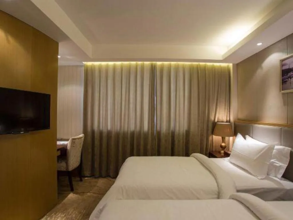 Bed in Jinjiang Metropolo Shanghai Minhang