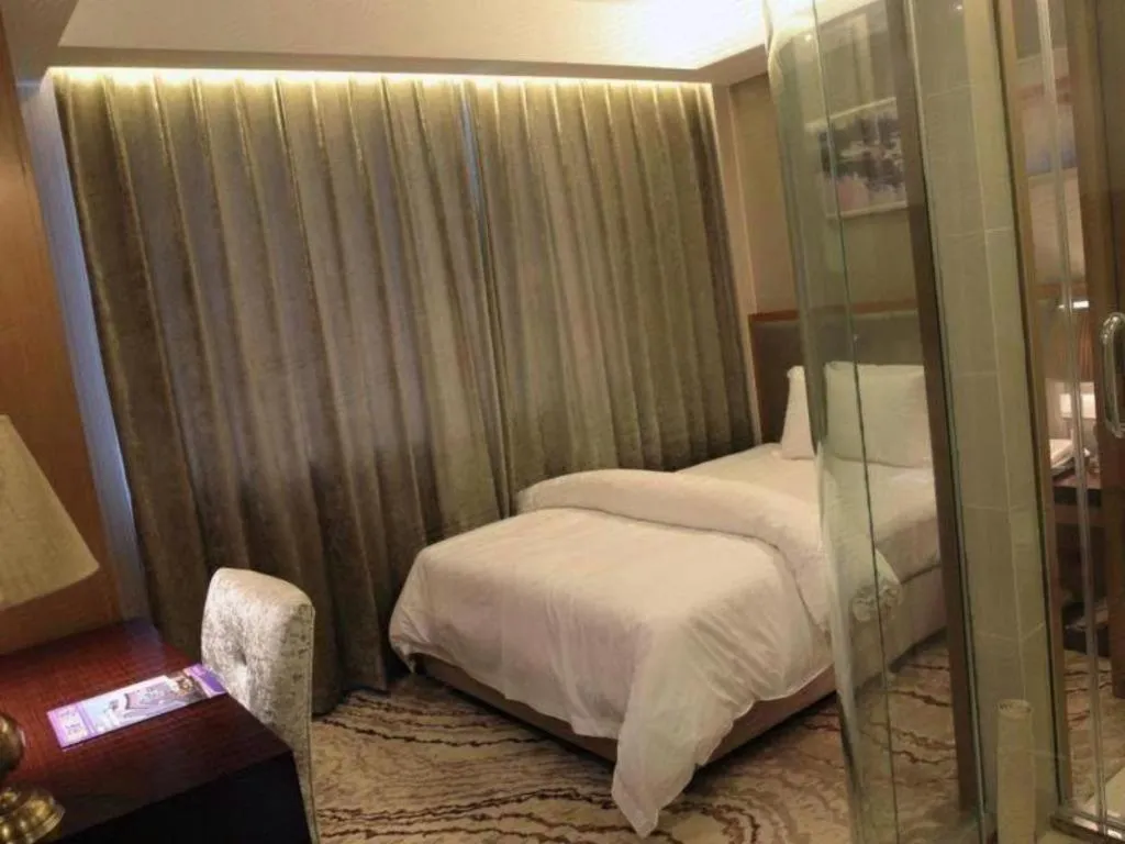 Bed in Jinjiang Metropolo Shanghai Minhang