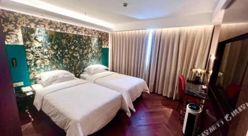 Bed in Jinjiang Metropolo Shanghai Minhang