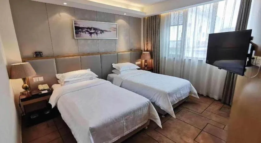 Bed in Jinjiang Metropolo Shanghai Minhang
