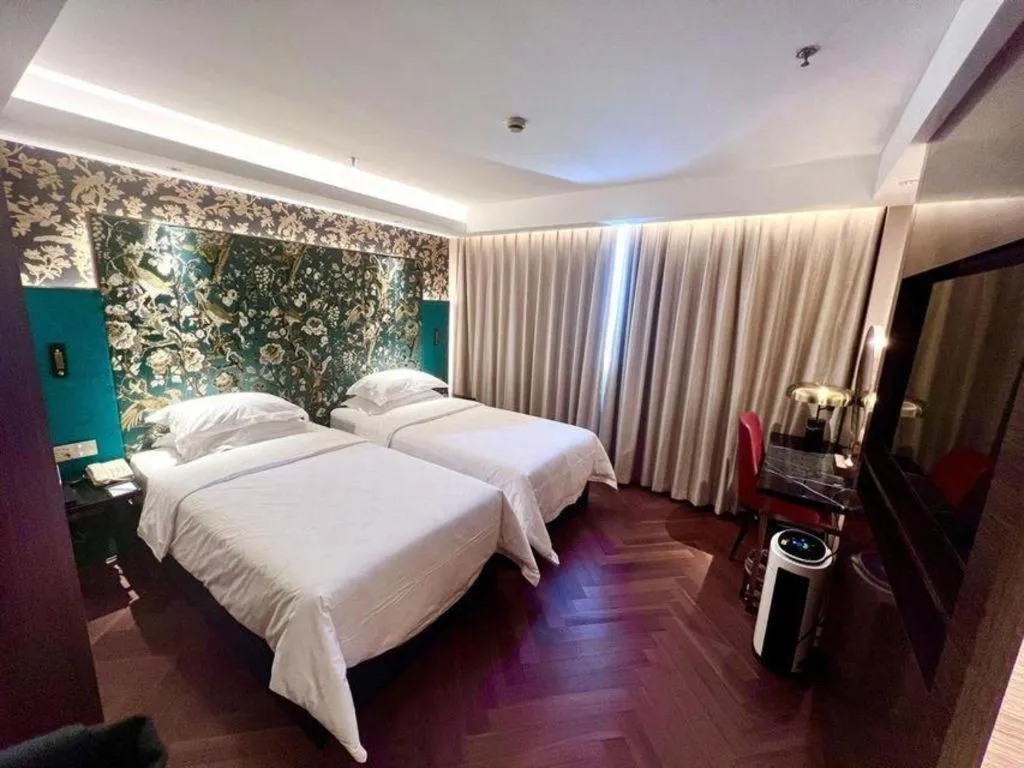 Bed in Jinjiang Metropolo Shanghai Minhang