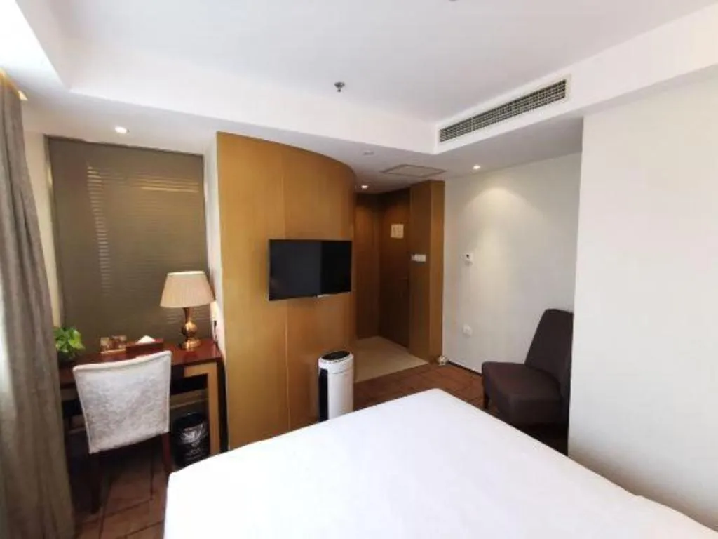 Bed in Jinjiang Metropolo Shanghai Minhang