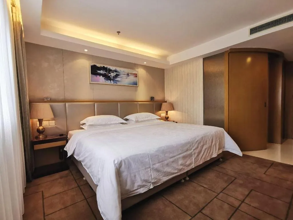 Bed in Jinjiang Metropolo Shanghai Minhang