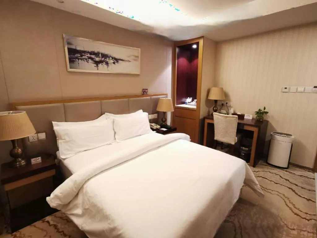 Bed in Jinjiang Metropolo Shanghai Minhang