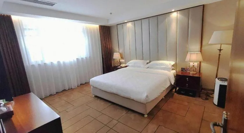 Bed in Jinjiang Metropolo Shanghai Minhang