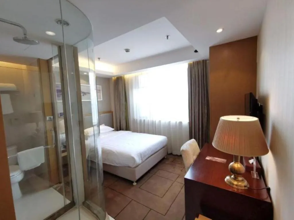 Bed in Jinjiang Metropolo Shanghai Minhang