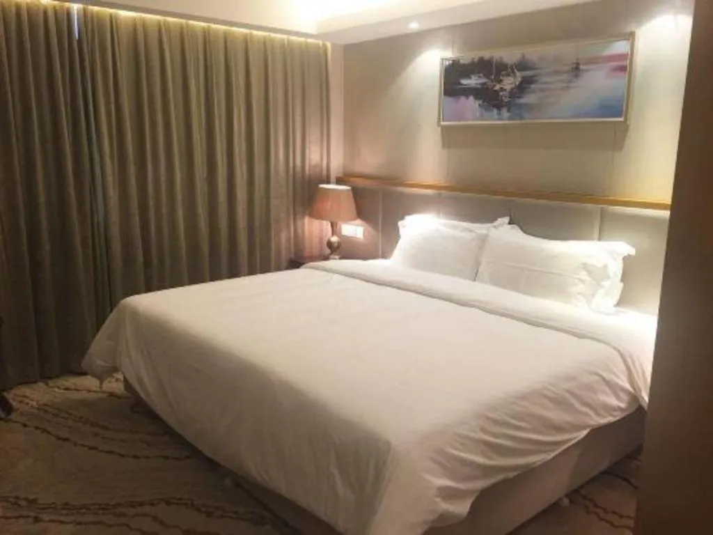 Bed in Jinjiang Metropolo Shanghai Minhang