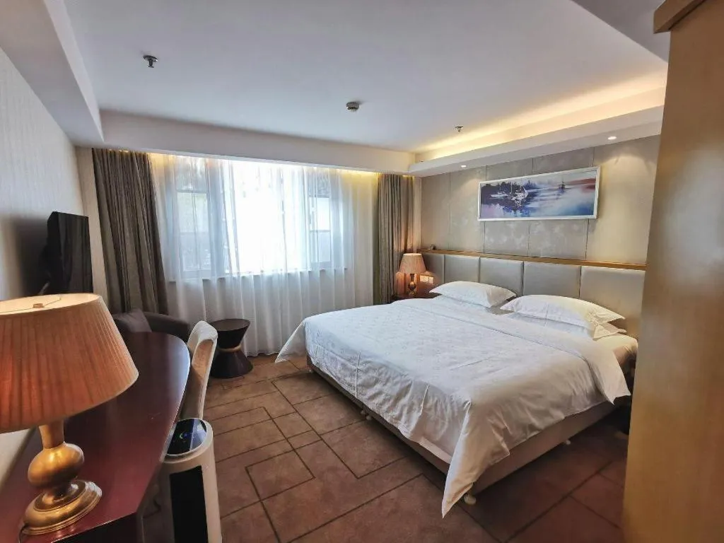 Bed in Jinjiang Metropolo Shanghai Minhang