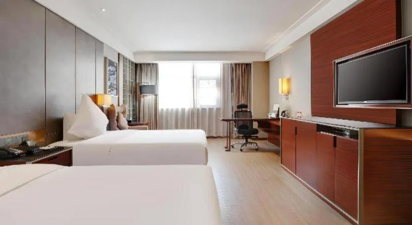 Bed in Echeng Hotel Wuhan Optics Valley Square Yangjiawan Metro Station
