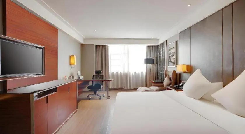 Bed in Echeng Hotel Wuhan Optics Valley Square Yangjiawan Metro Station