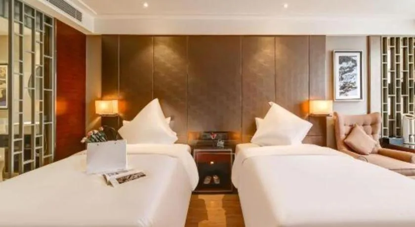 Bed in Echeng Hotel Wuhan Optics Valley Square Yangjiawan Metro Station