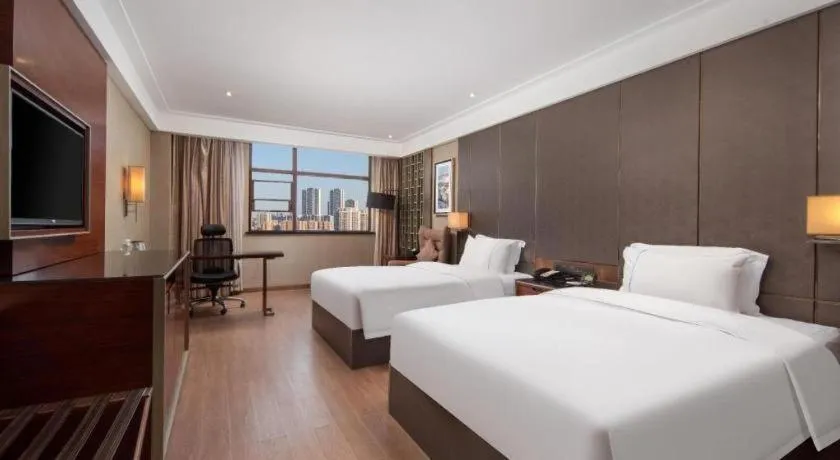 Bed in Echeng Hotel Wuhan Optics Valley Square Yangjiawan Metro Station