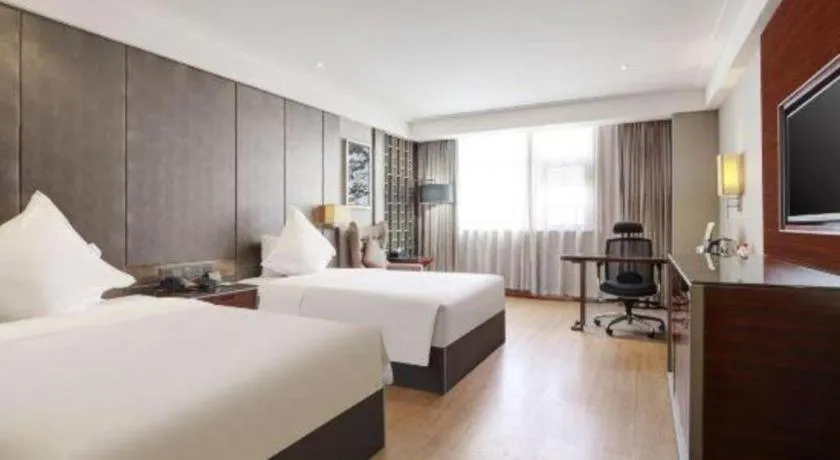 Bed in Echeng Hotel Wuhan Optics Valley Square Yangjiawan Metro Station