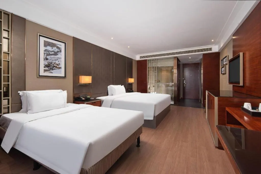 Bed in Echeng Hotel Wuhan Optics Valley Square Yangjiawan Metro Station