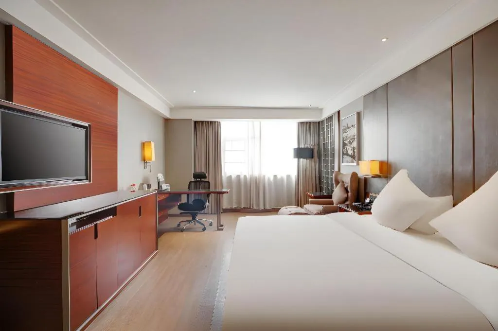 Bed in Echeng Hotel Wuhan Optics Valley Square Yangjiawan Metro Station