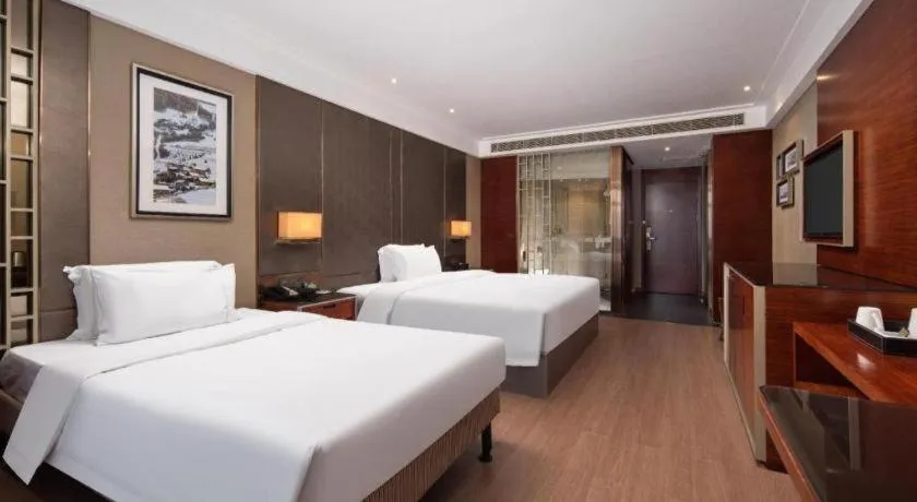Bed in Echeng Hotel Wuhan Optics Valley Square Yangjiawan Metro Station