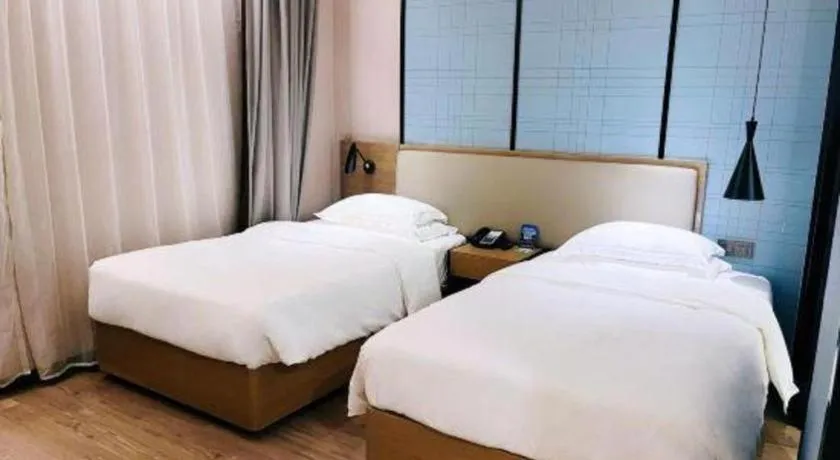 Bed in Echarm Hotel Jinan Railway Station Daming Lake