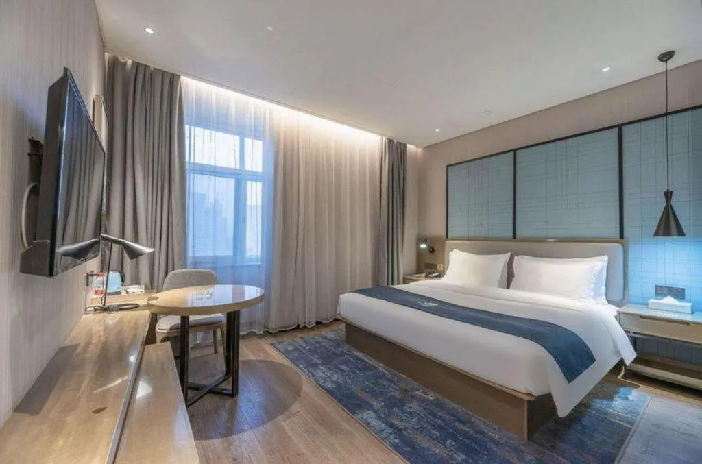 Bed in Echarm Hotel Jinan Railway Station Daming Lake