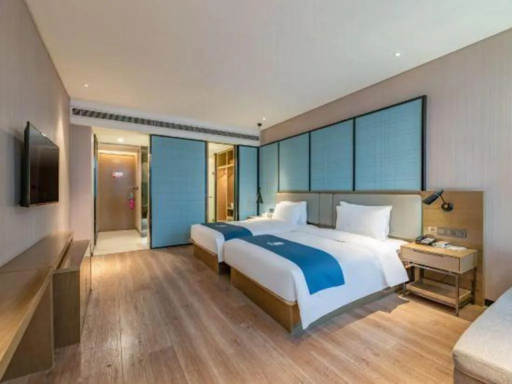 Bed in Echarm Hotel Jinan Railway Station Daming Lake