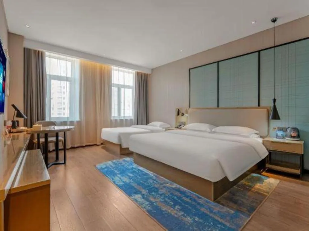 Bed in Echarm Hotel Jinan Railway Station Daming Lake