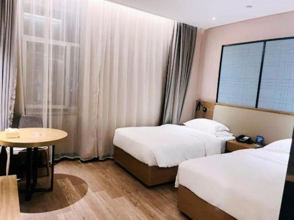Bed in Echarm Hotel Jinan Railway Station Daming Lake