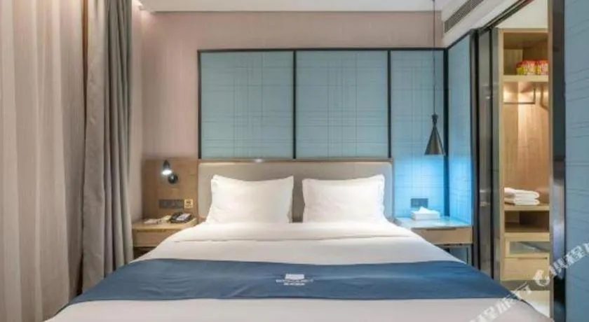 Bed in Echarm Hotel Jinan Railway Station Daming Lake