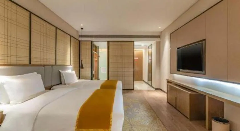 Bed in Echarm Hotel Jinan Railway Station Daming Lake