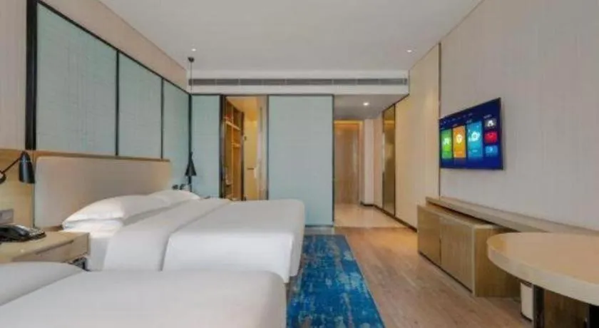 Bed in Echarm Hotel Jinan Railway Station Daming Lake