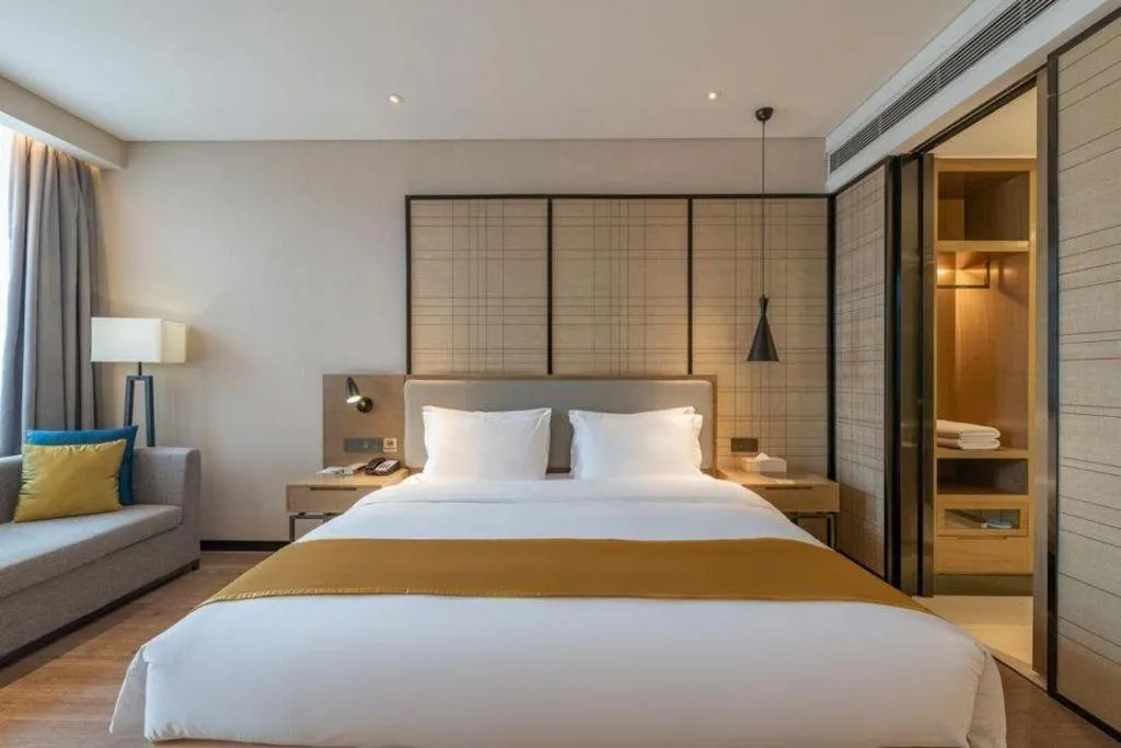 Bed in Echarm Hotel Jinan Railway Station Daming Lake